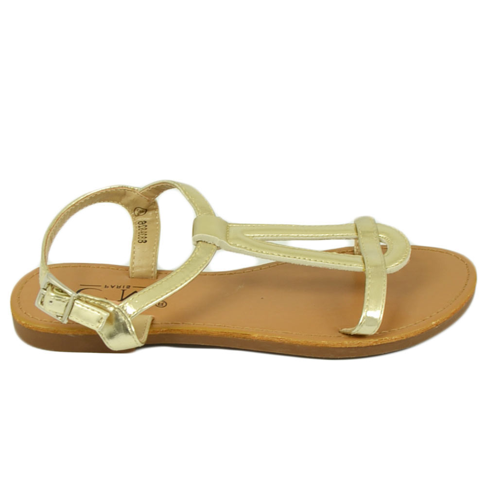 Sandalo basso positano oro donna fascetta con disegno ovale e cinturino regolabile alla caviglia moda greca basic.