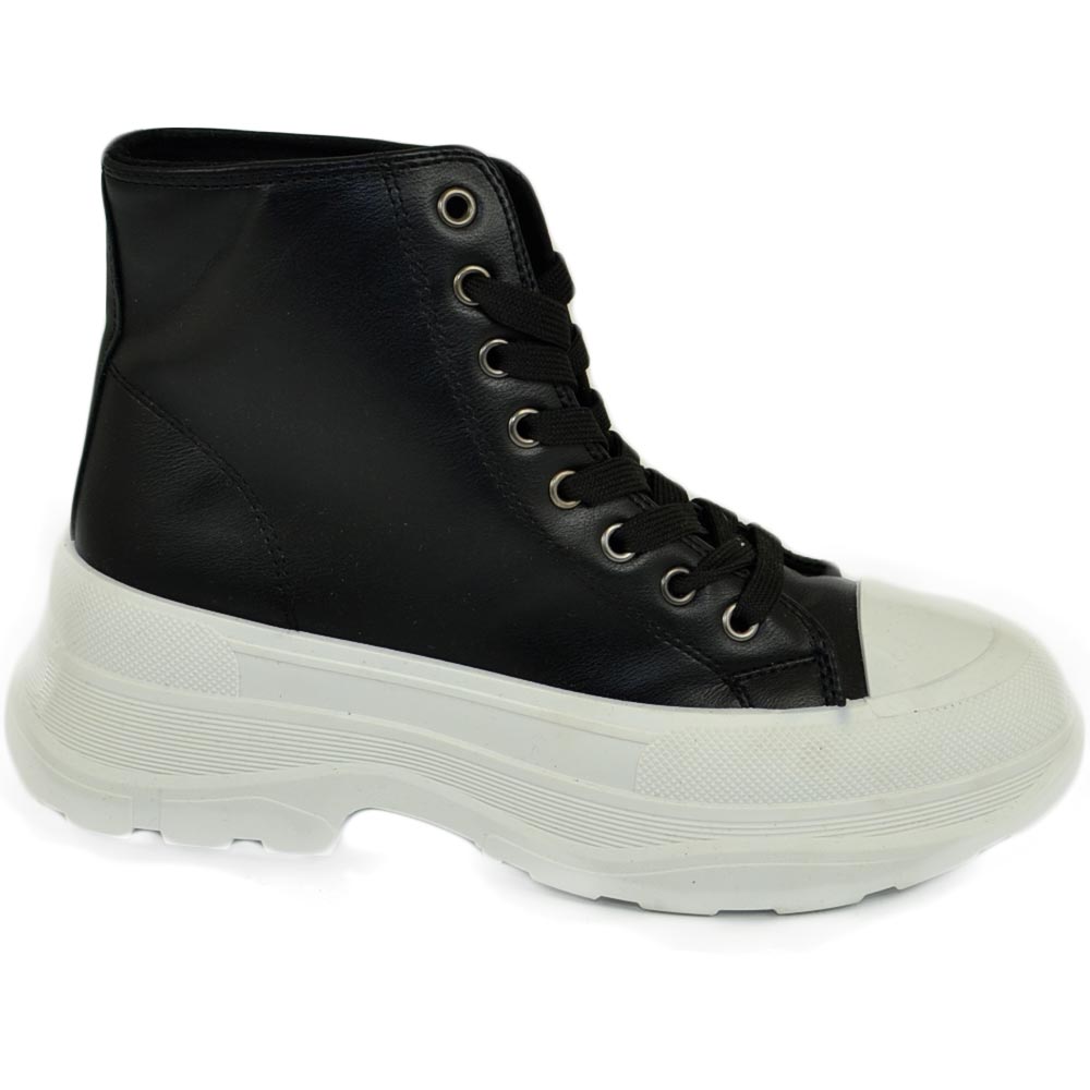 Sneakers alta donna stivaletto nero punta bianca gomma platform ondulata lacci moda tendenza street .