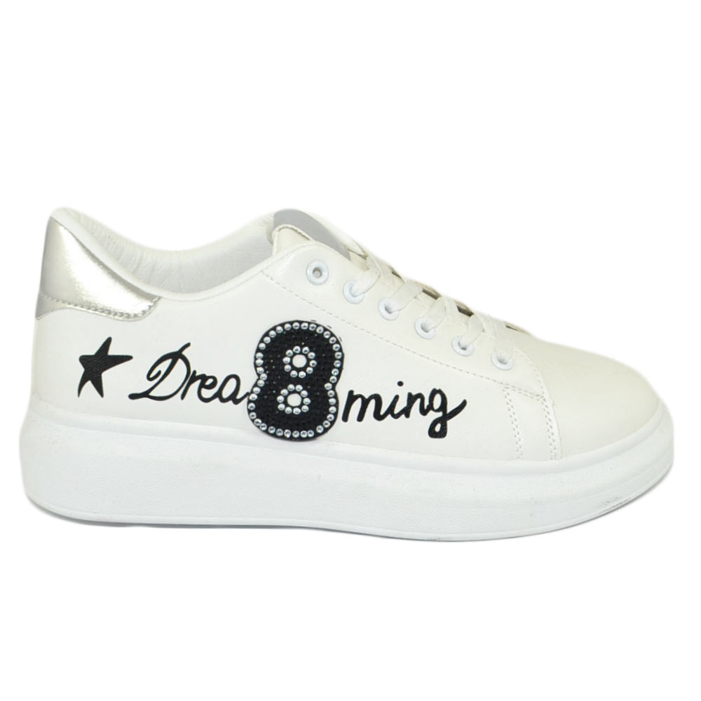 Sneakers bassa donna bianco pelle suola ondulata gomma applicazione nero otto argento scritte comodo moda.